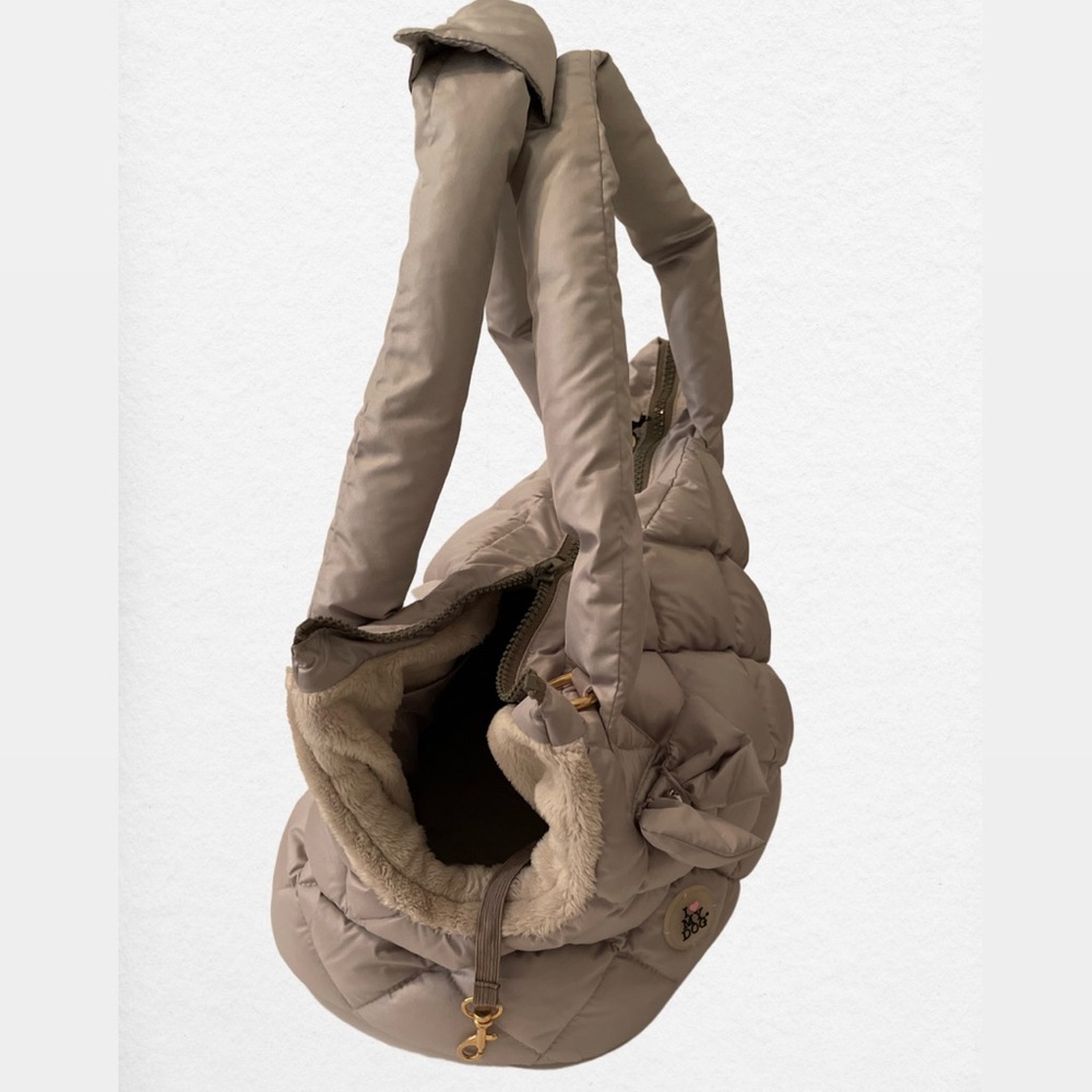 Dog (or cat) carry with a leather harness.